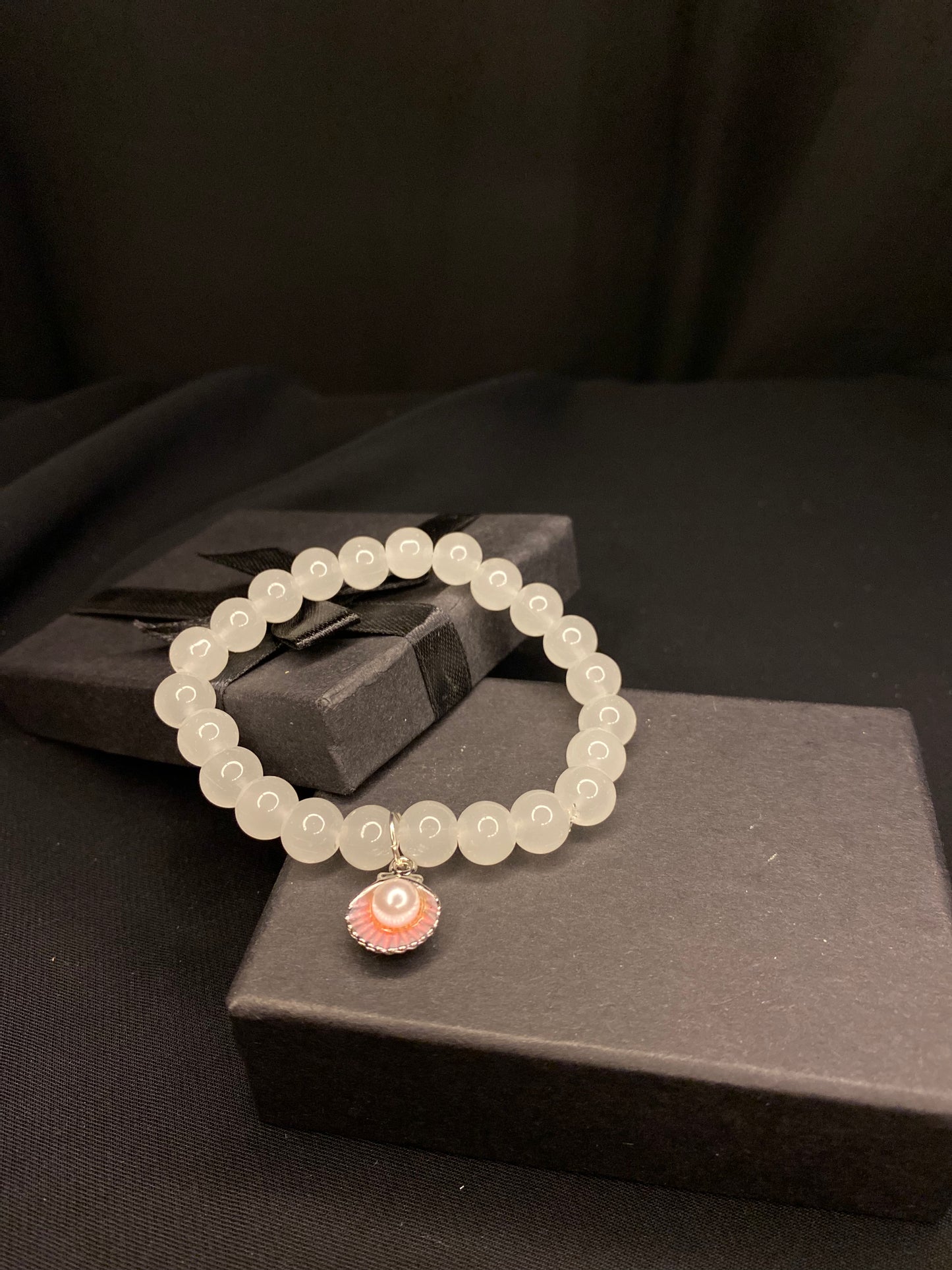 BRSTSHCH-00- Moon stone bracelet with shell charm