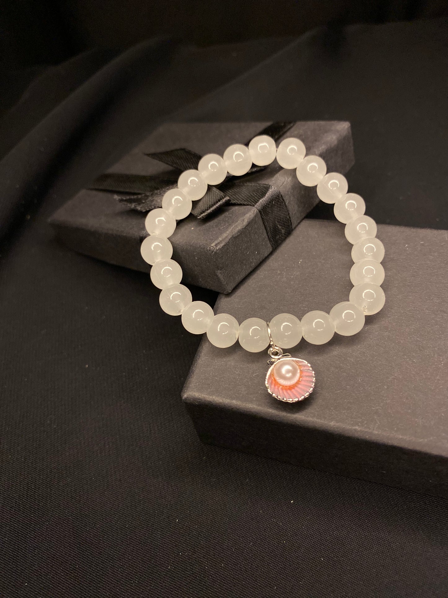 BRSTSHCH-00- Moon stone bracelet with shell charm