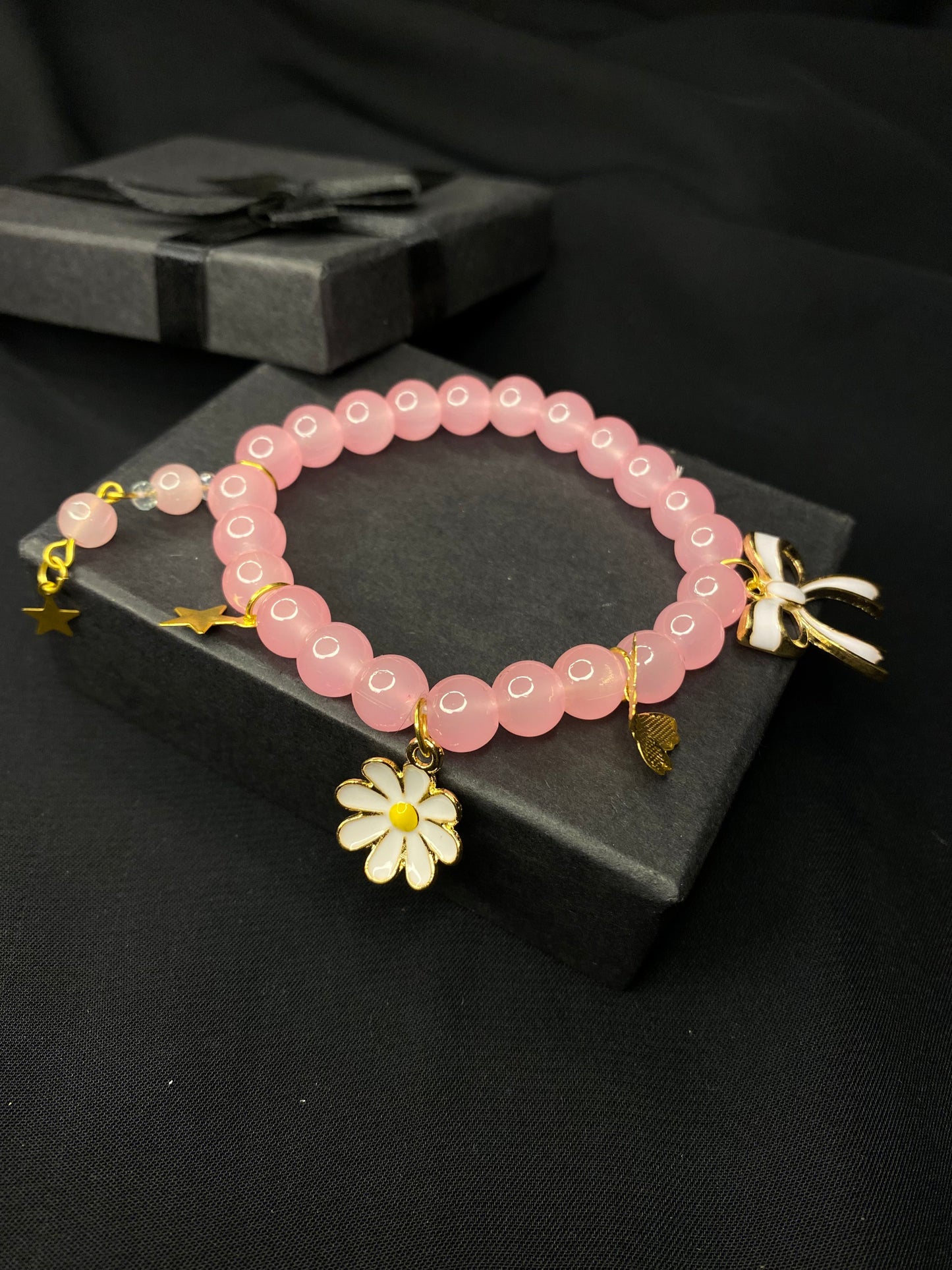 BRPNST-02-Pink Stone Bracelet with Hanging Charms( Daisy Flower, Star Butterfly, Bow)