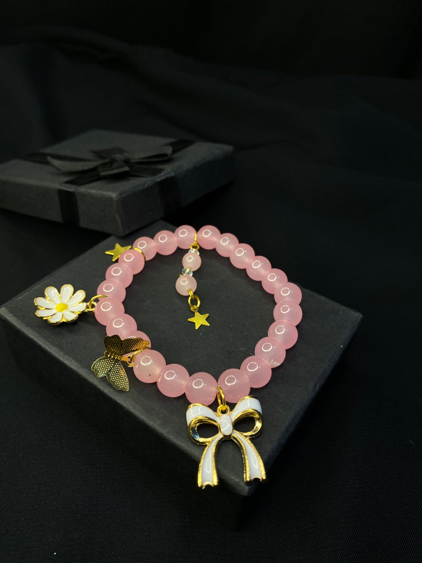 BRPNST-02-Pink Stone Bracelet with Hanging Charms( Daisy Flower, Star Butterfly, Bow)