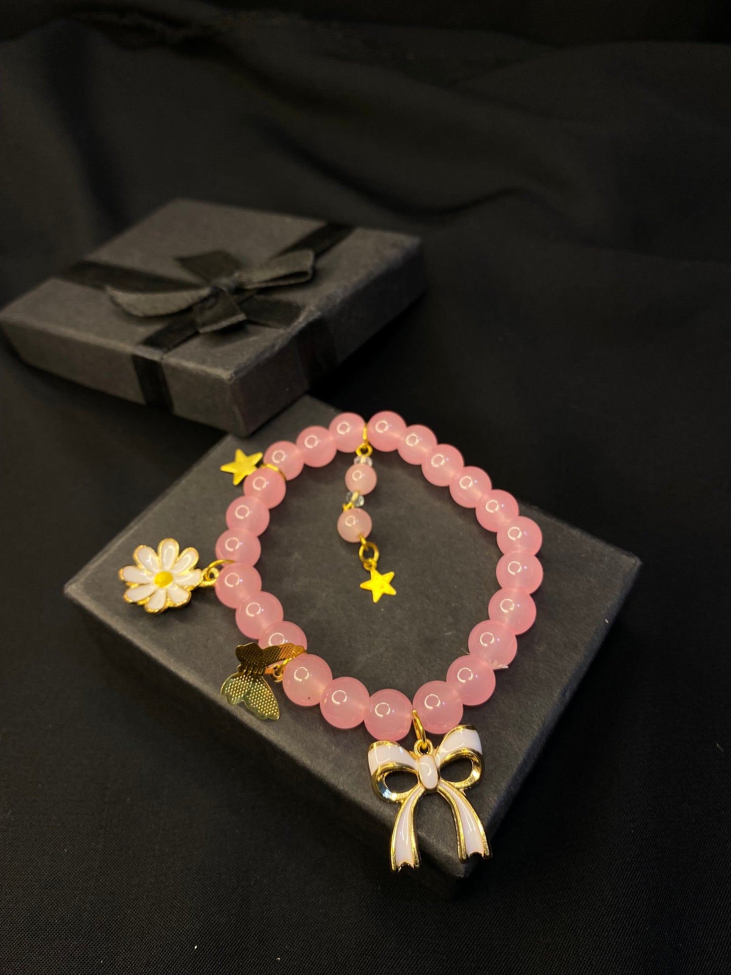 BRPNST-02-Pink Stone Bracelet with Hanging Charms( Daisy Flower, Star Butterfly, Bow)