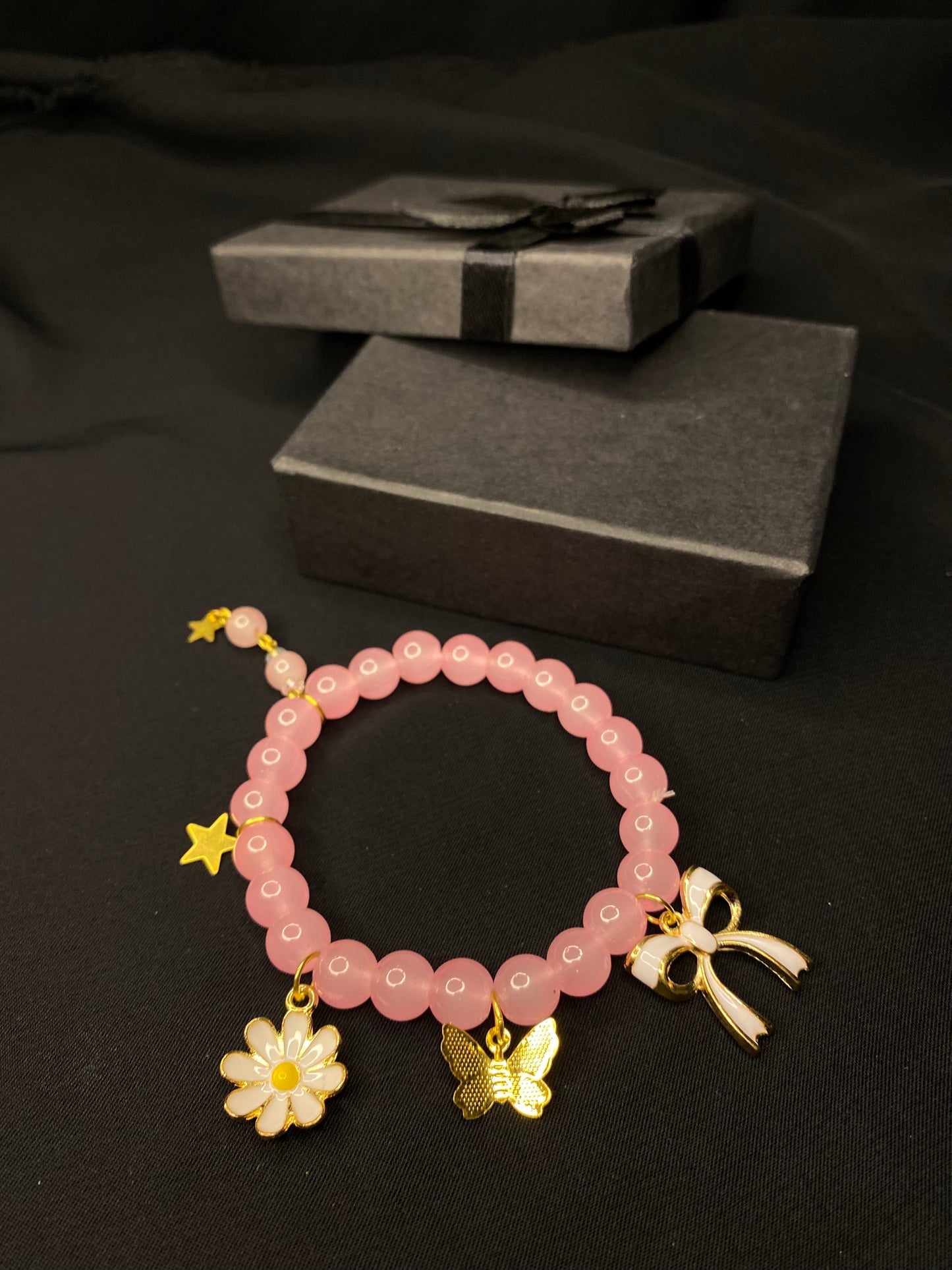 BRPNST-02-Pink Stone Bracelet with Hanging Charms( Daisy Flower, Star Butterfly, Bow)