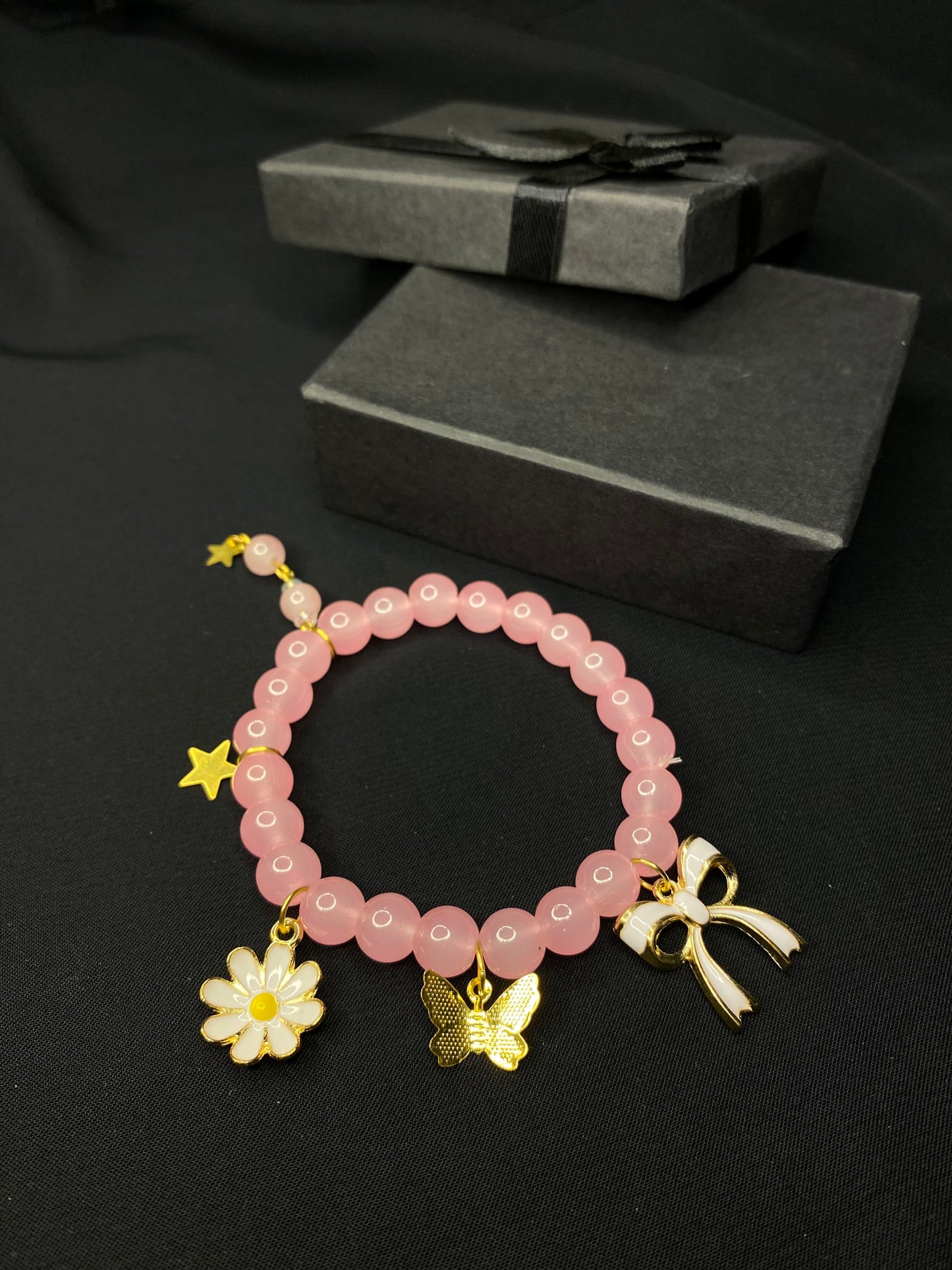 BRPNST-02-Pink Stone Bracelet with Hanging Charms( Daisy Flower, Star Butterfly, Bow)