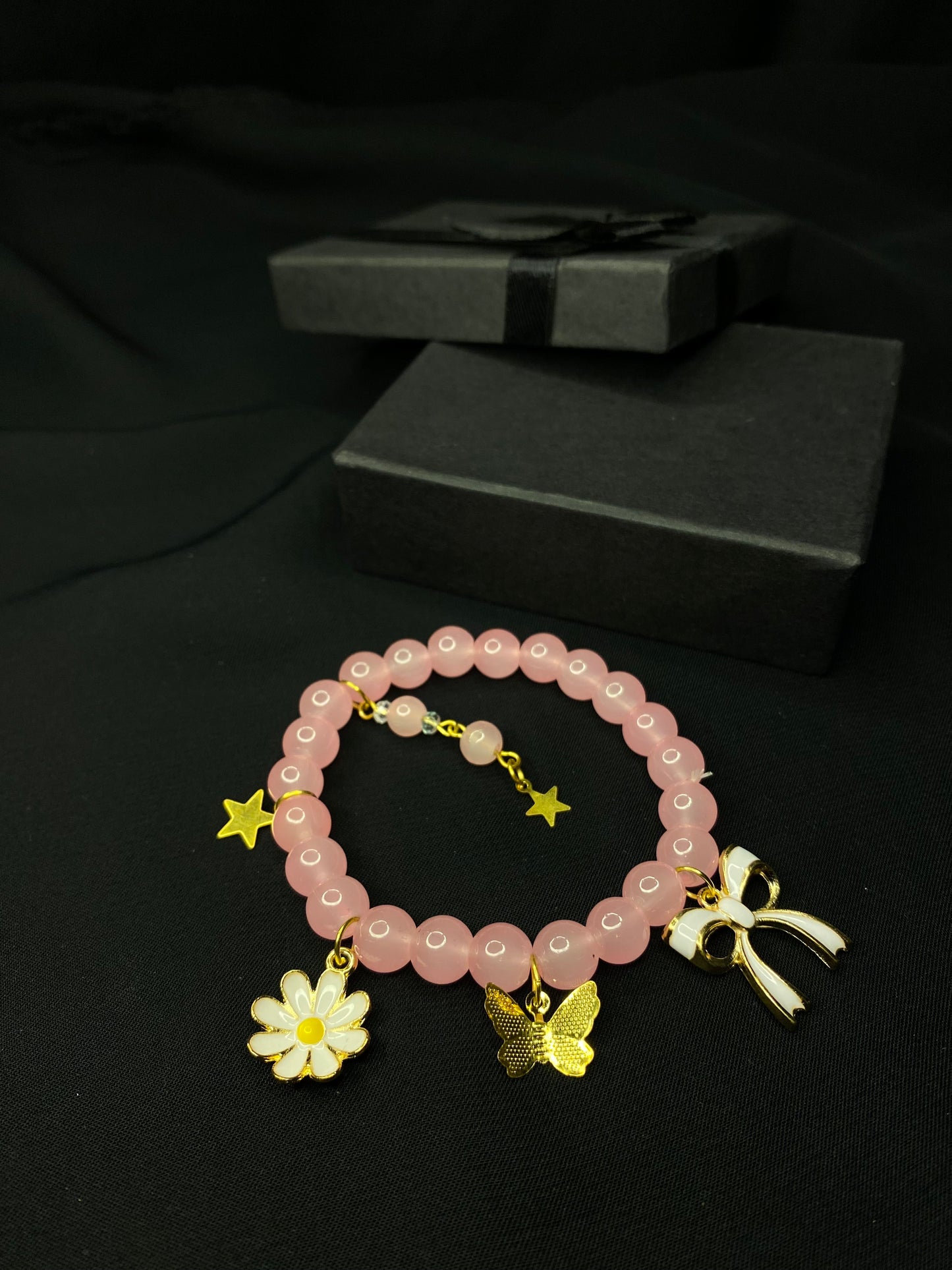 BRPNST-02-Pink Stone Bracelet with Hanging Charms( Daisy Flower, Star Butterfly, Bow)