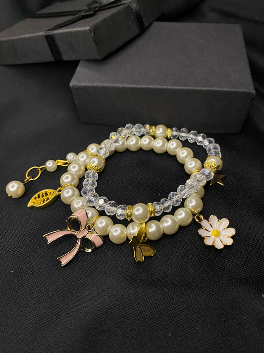 BRPMCH-00- Pearls Bracelet with Mix Charms( Butterfly, Daisy Flower, Bow, Leaf, Star)