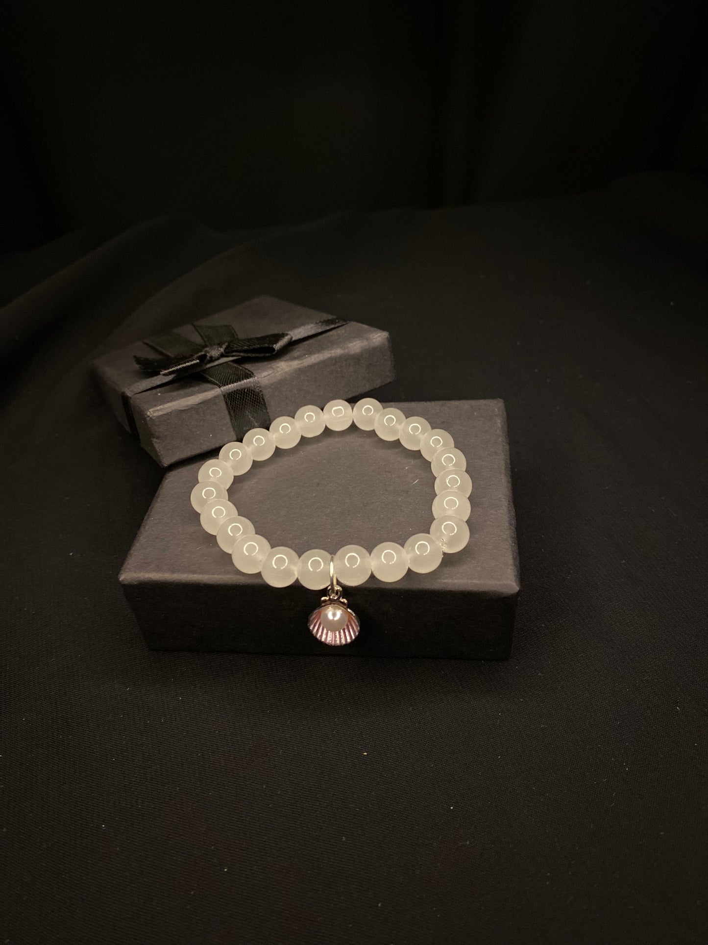 BRSTSHCH-00- Moon stone bracelet with shell charm