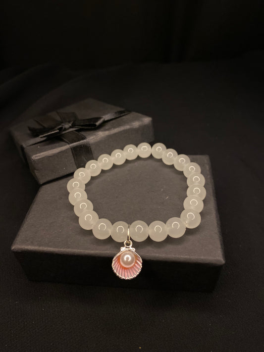 BRSTSHCH-00- Moon stone bracelet with shell charm