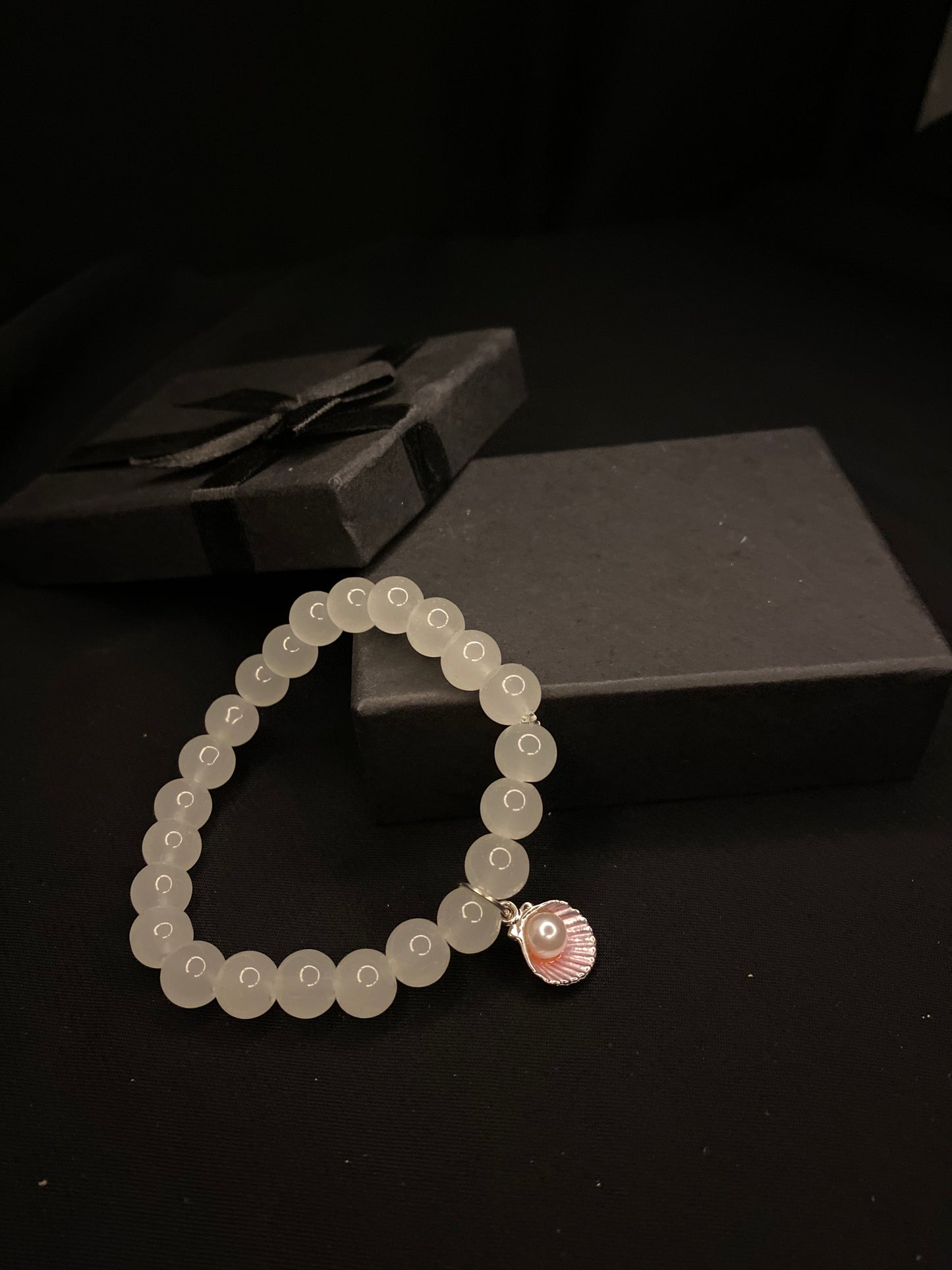 BRSTSHCH-00- Moon stone bracelet with shell charm