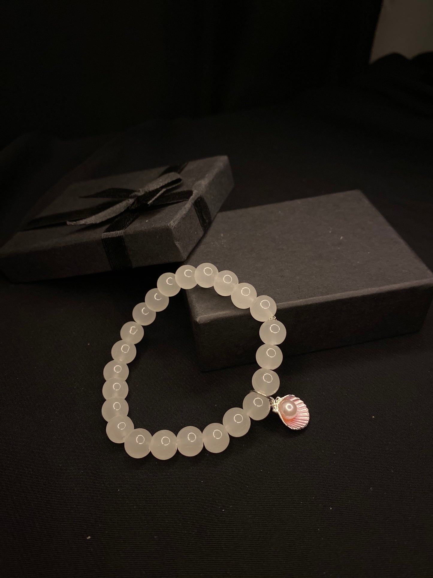 BRSTSHCH-00- Moon stone bracelet with shell charm