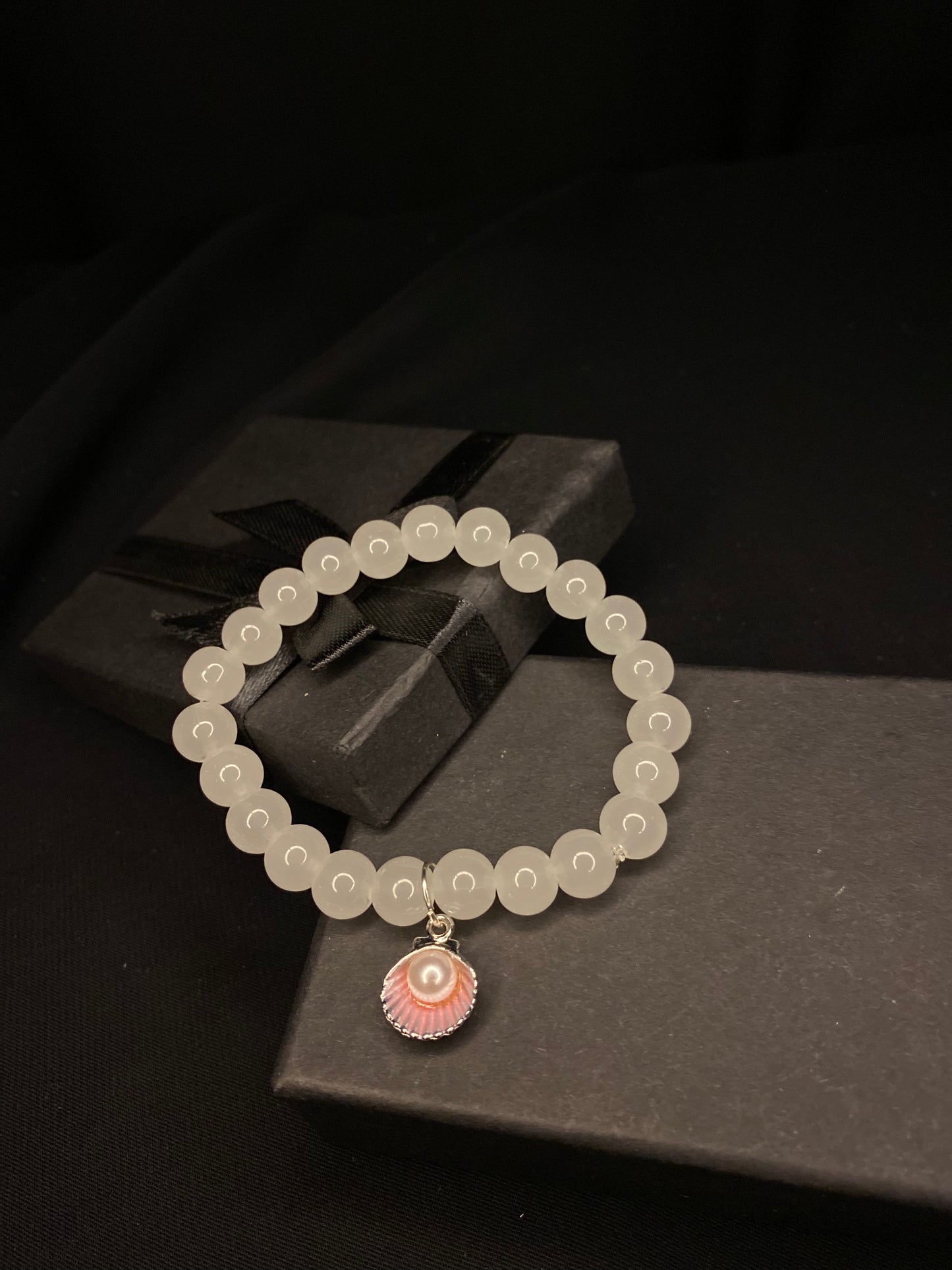BRSTSHCH-00- Moon stone bracelet with shell charm
