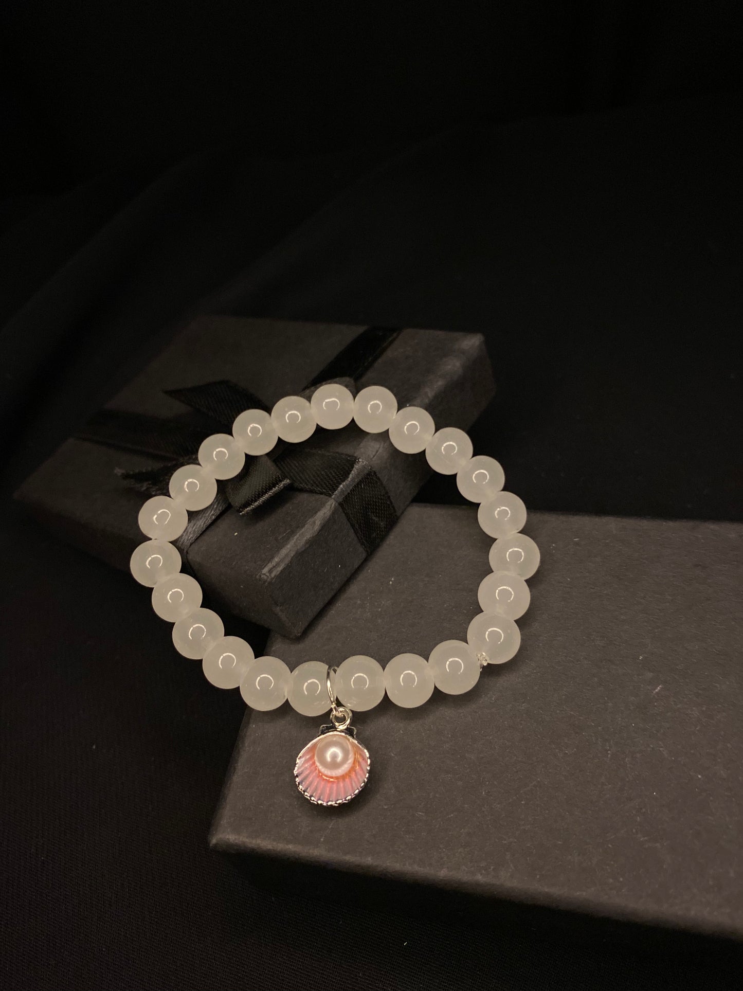 BRSTSHCH-00- Moon stone bracelet with shell charm