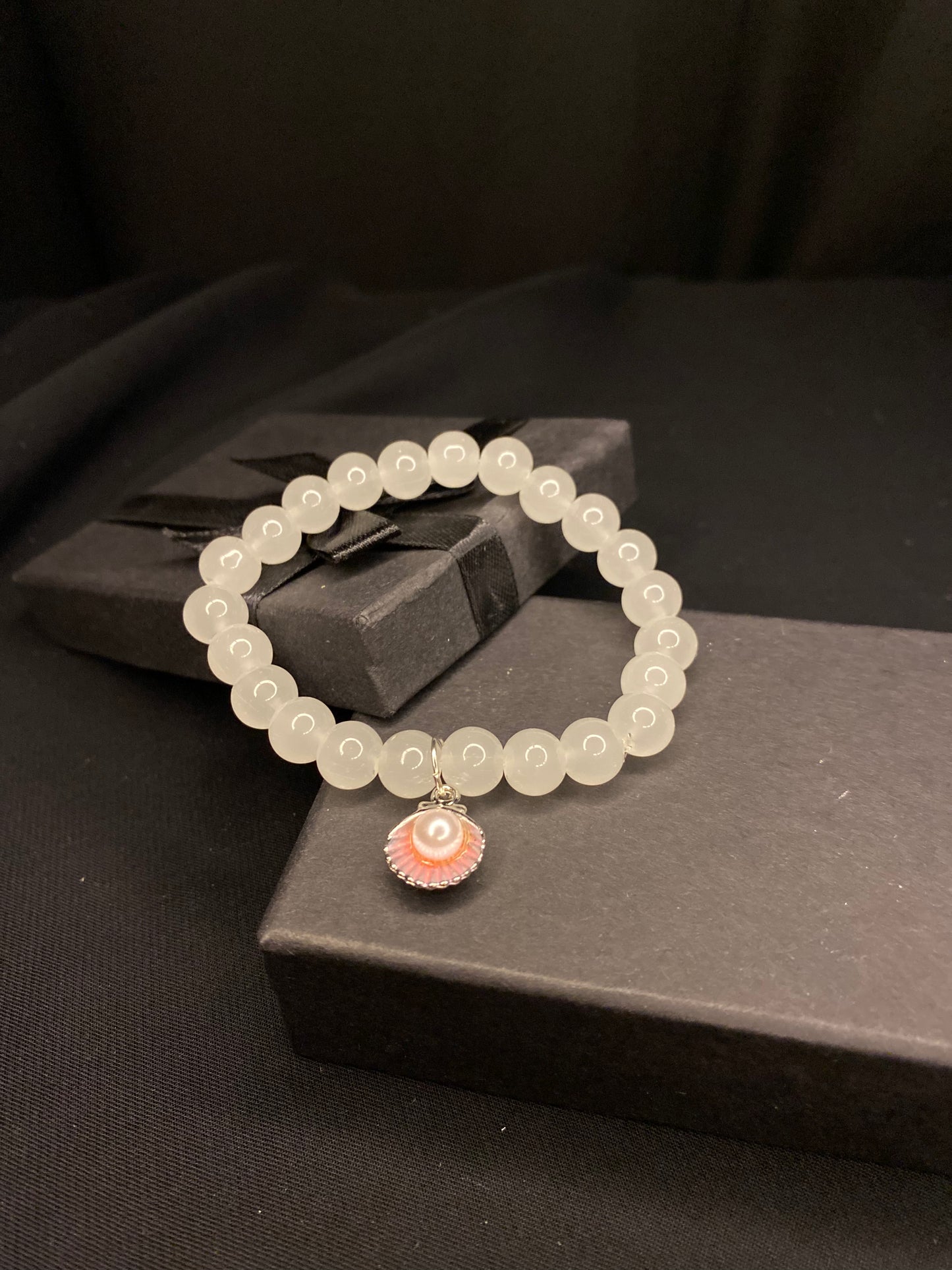 BRSTSHCH-00- Moon stone bracelet with shell charm