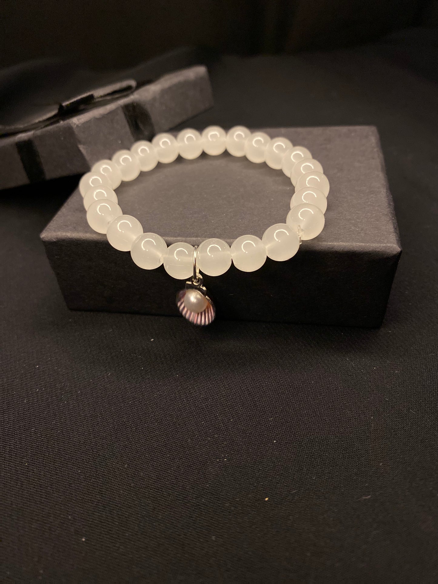 BRSTSHCH-00- Moon stone bracelet with shell charm